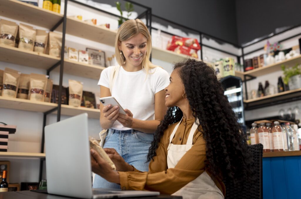 two people discussing marketing strategy in a small business owner and agency